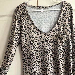 Medium long sleeve leopard print v-neck blouse/shirt.  Soft and comfortable!